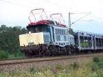 BR 194 178-0 (ehemalige 194 580) kommend von Freilassing, kurz nach Grokarolinenfeld mit einem leeren Autotransportzug der Fa. Mosolf Richtung Mnchen. Aufgenommen am 19.07.10.