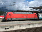 DB 101 115-4 mit EC 85  Michelangelo  von München Hbf nach Roma Termini beim Zwischenhalt in Wörgl Hbf.