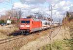 BR 101 091 auf dem Weg nach Frankfurt am Main. Gerade durchfhrt der Zug den Bahnhof Ribnitz-Damgarten Ost.