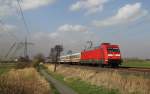 101 029-7 fuhr am 18.04.2013 mit dem IC 2332 von Norddeich Mole nach Kln, hier sdlich von Leer.
