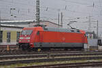 DB Lok 101 079-2 steht am 02.12.2022 auf einem Nebengleis beim badischen Bahnhof.