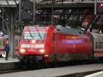 Die vom Regen glnzende 101 126-1 steht mit ihrer ex-Metropolitan Garnitur als IC 1112 Stuttgart Hbf - Berlin-Sdkreuz in Kln Hbf. 17.04.09