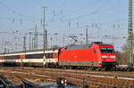 DB Lok 101 134-5 fährt beim Badischen Bahnhof ein. Das abzweigende Gleis führt auf einen Parkplatz, von wo aus auch diese Aufnahme am 18.01.2017 entstand.