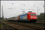 DB Werbelok Canarias fährt hier am 15.4.2006 um 18.09 Uhr mit einem Intercity in Richtung Münster durch den Bahnhof Hasbergen.