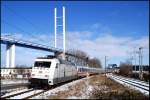 101 034-7 durchfhrt mit IC 2377 Binz-Frankfurt/M. am 13.02.2009 den Bahnhof Stralsund-Rgendamm.