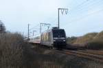 Die 101 141-0 am 24.03.2012 mit dem IC 2332 von Norddeich Mole nach Kln, hier bei Veenhusen.