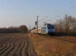 101 042-0 mit IC 2332 Emden Auenhafen-Kln Hauptbahnhof bei Devermhlen (B 296.6) am 23-3-2012.
