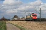 Glck gehabt. Nur wenige Sekunden nachdem der Zug durch war, schob sich eine Wolke vor der Sonne. Der Schatten ist bereits im Hintergrund zu erkennen. 101 016-4  Packendes Sdafrika Giraffenmotiv  mit dem EC 117 Frankfurt-Klagenfurt bei Bad Schnborn. Aufgenommen am 10.03.2013.