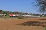 101 037 mit Eigenwerbung``Eisenbahner mit Herz gesucht``fährt mit dem IC 1271 aus Innsbruck Richtung Stuttgart.Aufgenommen bei Ebersbach an der Fils am 29.3.2014.