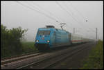 Bei dichtem Nebel ist hier am 6.5.2007 die Unicef Werbelok 101016 mit dem IC 146 bei Lotte nach Amsterdam unterwegs.