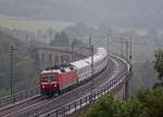 120 143-3 mit dem IC2359 aus Kln nach Stralsund auf dem Altenbekener Viadukt bei krftigem sch*** Wetter, 13.8.10