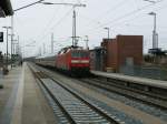 Als Schlulok fuhr,am 05.April 2011,120 157 ohne Halt,durch Bergen/Rgen,Zuglok war 101 018.
