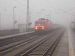 Der Neujahrstag 2016 war ein vernebelter Tag so das den ganzen Tag über den Bahnhof in Bergen/Rügen eine Nebelsuppe hing.120 103 konnte mit dem IC 2213 Binz-Stuttgart gerade noch erkannt