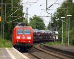 145 008-9 DB B kommt mit einem Suzuki-Autozug aus Gelsenkirchen-Bismarck(D) nach Zeebrugge-Pelikaan(B) und kommt aus Richtung Mönchengladbach-Hbf,Rheydt-Hbf,Wickrath,Beckrath,Herrath und fährt durch Erkelenz in Richtung Baal,Hückelhoven-Baal,Brachelen,Lindern,Süggerath,Geilenkirchen,Frelenberg,Zweibrüggen,Übach-Palenberg,Rimburg,Finkenrath,Hofstadt,Herzogenrath, Kohlscheid,Richterich,Laurensberg,Aachen-West. 
Aufgenommen vom Bahnsteig 1 in Erkelenz. 
Bei Sonne und Wolken am Nachmittag vom 12.6.2017.