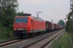 Elok 145 051-9 am 02.08.2007 in Castrop-Rauxel am Bahnbergang Beckumer Strae unterwegs mit einem gemischten Gterwagenzug.