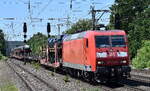 DB Cargo AG, Mainz mit ihrer  145 043-6  [NVR-Nummer: 91 80 6145 043-6 D-DB]und einem PKW-Transportzug am 15.05.24 Höhe Bahnhof Saarmund.