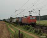 Einen weiteren Kombizug bringt 145 041-0 am Morgen des 15.08.09 bei Reinfeld (Holst.) Richtung Lbeck-Skandinavienkai.
