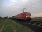 145 004 mit Gz Richtung Mannheim.Am 05.12.09 in Lampertheim.