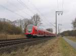 145 125-0 mit RE 4427 Nordeich Mole-Hannover Hauptbahnhof bei Elsinghausen am 19-03-2010.