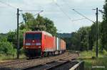 145 079-0 bringt am 23.06.10 einen Containerzug Hafeneinwrts durch Hamburg-Moorburg zum Rbf Alte-Sderelbe.