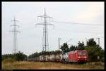 145 016 fhrt am 17. Juli 2010 an einer Horde Fotografen in der Nhe von Wiesental vorbei.