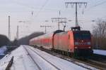 145 042-8 mit dem RE 2 nach Mnster in Essen-Fronhausen am 04.01.2011