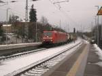 Hier 145 007-1 mit einem Gterzug in Richtung Berlin, bei der Durchfahrt am 13.2.2011 durch Bad Belzig.