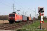 145 069-1 (Railion DB Logistics) fhrt am 2. April 2011 um 15:25 Uhr mit einem Gterzug durch Kaarst