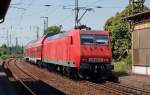 145 048 schob am 04.06.11 eine S1 aus dem Bahnhof Coswig(Dresden) ihrem Ziel Meien entgegen.