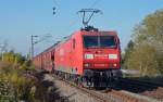 145 056 fuhr mit einem Autozug am 23.10.11 durch Halle-Rosengarten Richtung Rbf Halle(S).