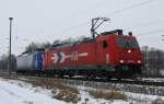 12.02.2012 Passow. 185 584-0 mit 145-CL-201 kurz vor dem Abzweig zur Werkbahn nach Stendell.