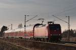 145 047 zieht den RE 16725 am 16.03.2012 in Richtung Dresden (bei Zeithain)