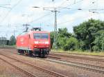 145 053-5 nach dem Passieren des Bahnhofs Saarmund in Richtung Grobeeren am 04. Juli 2012.