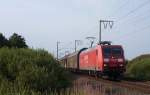 145 065-9 fuhr am 21.08.2012 mit einem Güterzug von Emden nach Osnabrück, hier bei Veenhusen.