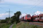 145 009-7 fuhr am 22.08.2012 mit einem Autoteilezug von Emden nach Osnabrck, hier sdlich von Leer.