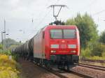 145 050-1 mit einem Ganzzug Kesselwagen  in Blankenfelde (Brandenburg) in Hhe des Bahnbergang am Tunnelweg am 21.
