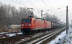 Zusammen mit ihrer Schwester 145 059 bespannte 145 021 am 31.01.14 einen Kesselwagenzug. Hier ziehen beide ihren Zug durch Leipzig-Thekla Richtung Mockau.