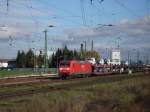 145 049 am 18.11.06 mit einem Umleiter Gterzug in Biblis.