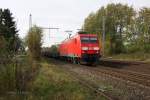 145012 war am 27.11.2014 um 11.43 Uhr in Westerkappeln - Velpe mit einem Brammen Zug Richtung Osnabrück unterwegs.