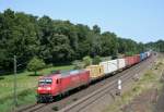 145 053 mit KM 50456 (Maschen Rbf–Bremerhaven-Speckenbttel) am 09.07.2013 in Lauenbrck