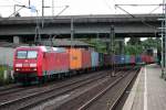 Am 13.08.2014 fuhr 145 005-5 mit einem Containerzug aus Richtung Hafen durch Harburg durch.