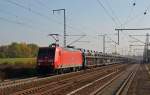 145 067 zog am 31.10.15 einen langen Autozug der Marken Peugeot/Citroen durch Rodleben Richtung Magdeburg.