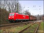 145 065 in neu wirkendem Lack, kommt mit einem Bunkerzug aus Richtung Dbeln im Bf Riesa an, 15.03.07.