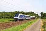 Deutschland 
Lok 145 040 von TRI zieht einem Personenzug RB37 Krefeld - Neuss, in Bösinghoven 
19/9/2025
