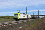 145 095 der Captrain schleppte am 09.04.26 einen Kesselwagenzug durch Brehna Richtung Halle(S).