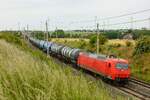 145 090-7 mit GATX-Kesselzug in Ovelg�nne, Juni 2023.