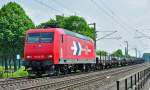 145-CL 012 der HGK mit Rungenwagen unterwegs kurz vor`m Bf Brhl - Richtung Kln - 28.05.2010