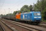 145 030-7+111 038-6 am Wasserglas-Zug von Rostock-Bramow nach Wurzen kurz vor der Ausfahrt in Rostock-Bramow.25.07.2014 