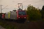 Ein RHC Zug bestehten aus der 145 084-0, die 119 007-2, 271 057-4 und die 185 631-9 und jedemenge Kesselwagen in Richtung Neuss am Fotografen vorbei gefahren.