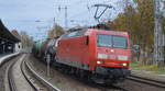 DB Cargo AG [D] mit  145 079-0  [NVR-Nummer: 91 80 6145 079-0 D-DB] und einem gemischten Kesselwagenzug Richtung Rangierbahnhof Seddin am 18.11.20 Bf.